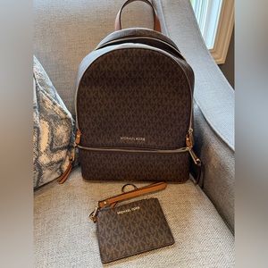 Excellent used condition Michael Kors backpack and wallet